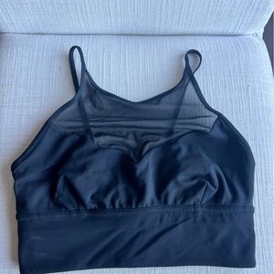 Black Lululemon sports bra with mesh, size 4